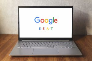 Google's 2023 core algorithm updates | Laptop with Google E-E-A-T