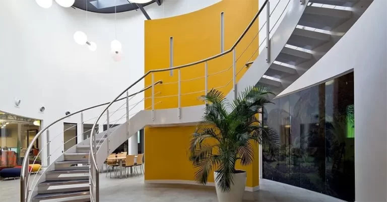Metalwork staircase in office atrium