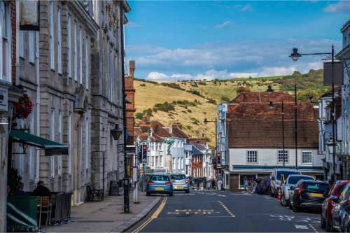 web design lewes top of high street with parked cars and historic looking buildings