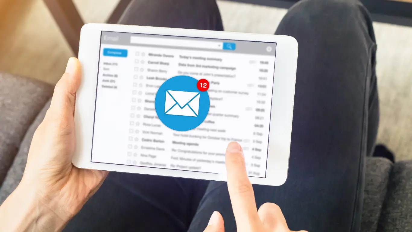 tablet showing emails on the screen
