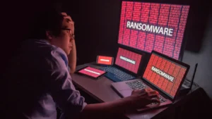 computer screens showing a ransomware attack