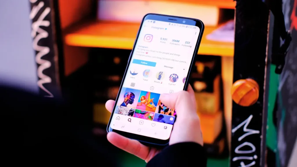 Mobile phone showing an Instagram account for a social media marketing agency UK