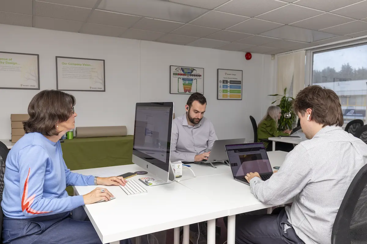 email marketing for small businesses. growth by design team working on client strategy work at desks