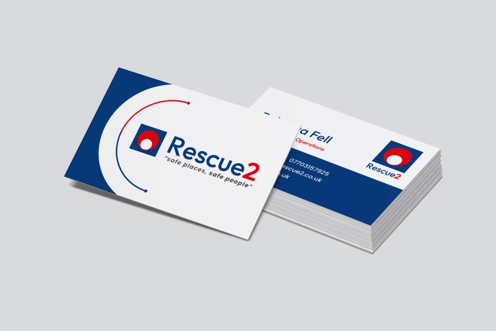 Rescue2 business cards in stack and one propped forward for display